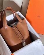 Picotin 18 / gold with silver hardware